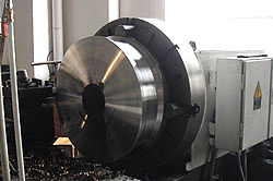 An industrial sheave being turned on a lathe in our workshop An industrial sheave being turned on a lathe in our workshop